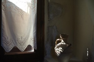 Afternoon sunlight coming through the lace curtain