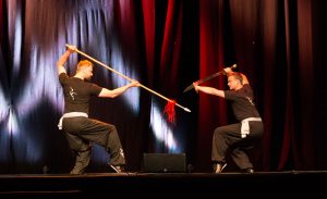 Instructors Danil Mikhailov (Spear) and Nick Fielding (Broadsword) of the Fujian White Crane Kung Fu & Tai Chi Martial Arts Club (FWC Kung Fu) perform a two-person pattern at the Club's 40th Anniversary Celebration